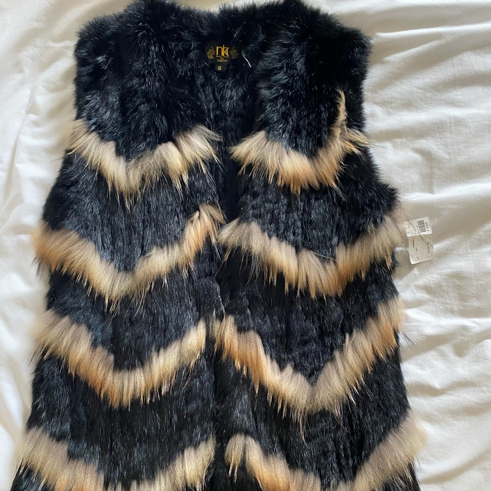 Like new metric knits collection fur vest